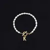 2025 Moda Nueva Transfronteriza Pulsera de Letras Inglesas Cobre Incrustado Circonita Oval Perla de Imitación Pulsera de Perlas al por Mayor