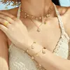 Venta Caliente Europea y Americana Trébol de Cuatro Hojas Súper Brillante Completo de Diamantes Circonita DIY Multi-Accesorio Set de Collar y Pulsera Acero Inoxidable Chapado en Oro de 18K
