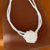 Collar de flor de perla con circonita y cuentas de doble capa, cadena para la clavícula de lujo ligero de nicho de alta gama, accesorio elegante y con estilo