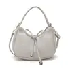 Bolsa de Ombro Grande e Moderna para o Dia a Dia 2026 Novo Modelo Cor Sólida Laço Elegante Transversal Ombro Axila Bolsa de Mão Bolsa Dumpling