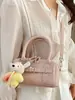 Bolsa de mano bandolera de alta gama, elegante, sencilla, estilo nuevo, primavera 2026, transfronteriza, bolso de moda y elegante para mujer
