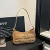 Bolso de axila de estilo coreano muy elegante y moderno, nuevo modelo 2026, bolso de hombro casual simple, bolso cruzado de diseño de nicho de moda