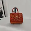 Bolsita de piel charol con patrón de cocodrilo, mini bolso casual platino pequeño, bolsa para auriculares, bolsa con colgante de coche lindo, varios colgantes de bolso