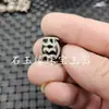 Preto e branco três olhos Tianzhu luantong Jade contas soltas ágata Tianzhu caráter nobre Ruyi Dente de tigre contas balde atacado