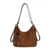 Moda retro simple para ir al trabajo, colgante de gran capacidad 2026, nuevo para mujer de otoño, bolso de hombro único, mochila cruzada