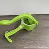 Exprimidor manual multifuncional para el hogar, pequeño exprimidor de limón, fruta, naranja, prensa de frutas de plástico, exprimidor en stock