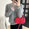 Suéter suave y ceroso de terciopelo de mapache para mujer Otoño e Invierno 2024 Nuevo suéter de punto de alta gama estilo coreano Suelto Top básico interior