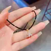 Collar Corto Único de Flor de Zircón con Perlas de Cristal Negro Vintage para Mujer con un Gargantilla Cadena para Clavícula de Lujo Ligero de Alta Gama para Mujer Tendencia