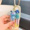 Llavero creativo de acrílico colorido con forma de oso en forma de corazón, bonito colgante de dibujos animados para pareja, adornos para coche, regalo al por mayor