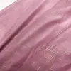 Nuevo tejido de gasa con rayas en relieve dorado y líneas geométricas, adecuado para decoraciones de bodas, cortinas, accesorios y materiales de confección.