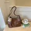 Bolsas para Viajantes Transfronteiriços para Mulheres 2026 Verão Novo Estilo Mochilas Bolsas de Ombro Texturizadas Tendência Bolsas Tote de Grande Capacidade