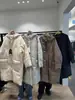 No hay devoluciones ni cambios Invierno 2025 Nuevo Coreano Dongdaemun Br*Ni Con Capucha Botón de Palanca Nuevo Estándar Nacional 90 Chaqueta de Plumas de Pato