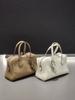 Bolsa Tote de Couro de Camurça Togo Feminina 2025 Nova de Alto Padrão Portátil para Trabalho Ombro Bolsa Boston Bowling