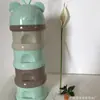 Caja de leche en polvo para bebé caja de leche en polvo para bebé gran capacidad apertura recta cuatro capas portátil caja de leche en polvo venta directa de fábrica embotelladora