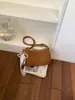 Bolsa de axila retrô para mulheres 2026 novo modelo bolsa transversal simples para o dia a dia versão coreana de alto valor bolsa de ombro único estilo bolinho tendência