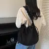 Bolsa Tote de Cordão Simples Transfronteiriça para Mulheres Outono 2025 Nova Bolsa de Ombro Transversal de Veludo de Luxo Leve