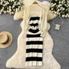 Vestido de punto con tirantes a rayas Crochet calado Chaqueta protectora solar Yujie Temperamento ligero Traje de socialité Femenino Verano