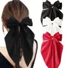 Pinza para el pelo grande de clip de resorte con lazo de satén popular transfronterizo, pasador de color sólido para mujeres, accesorios para el cabello