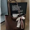 Bolso tote para mujer, nicho transfronterizo 2026 nuevo bolso tejido, bolso casual de gran capacidad para mujer, bolso de hombro estilo coreano