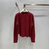 Versión de Gama Alta del Nuevo Suéter de Lana de Punto Liso con Bordado Geométrico Redondo de Manga Larga de Loe, Colección Principios de Otoño 25