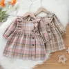 Fábrica de Origen Comercio Exterior Mercancía Transfronteriza Venta al por Mayor Vestido de Cuadros Otoño e Invierno para Niñas l Vestido Grueso de Manga Larga Ropa Infantil