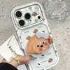 Este suporte de telefone adorável e fofo em formato de cachorrinho se transforma instantaneamente em uma capa colorida como doce, adequada para telefones Apple 17 e iPhone 16 Pro Max