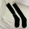 Calcetines de lana para pantorrilla IOULOR otoño e invierno calcetines gruesos calcetines de rizo de doble aguja marrones calcetines para mujer japoneses y calcetines hasta la rodilla al por mayor