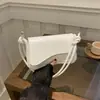 2025 Nuevo Estilo Bolso de Hombro Flip Simple de Moda para Viajes Diarios Bolso Cuadrado Pequeño Bolso de Mano Versátil para Mujeres Venta al por Mayor
