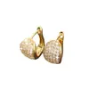 Nuevo diseño de hebilla de oreja redonda geométrica de cobre incrustado de circonio elegante europeo y americano Pendiente de aro brillante para mujer venta al por mayor de fábrica