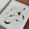 Collar de Cadena de Hueso de Serpiente Ojo de Tigre Marrón Maillard de Moda Francesa Cadena Larga de Lana Nicho de Alta Gama para Mujer