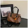 Bolsa de Hombro Individual de Gran Capacidad para Comercio Exterior para Mujer 2026 Nuevo Otoño Invierno Versátil Bolsa Tote Simple para el Trabajo Manual Cruzada