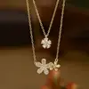 Cadena de Clavícula Elegante con Zirconia Microincrustada Galvanizada en Oro Real Diseño de Nicho Femenino Cadena para el Cuello Versátil Collar de Pétalo de Margarita Pequeña