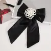 2025 Novo Estilo Presilha de Cabelo com Laço de Pérola Cetim Elegante Moda Doce Acessório de Cabelo para Meninas Atacado Atacado para Feiras