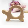 Suministro directo de fábrica palo para morder dientes de bebé Madera de haya diente calmar forma de animal palo para morder dientes morder música