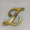 Nuevo acrílico dorado transfronterizo letra de pasto Pegatinas de espejo sala de estar dormitorio autoadhesivas pegatinas de pared decorativas 3D