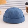 Ins primavera y otoño nuevo estilo coreano para niños bebé todo partido letras moda otoño e invierno cálido gorro de piso moderno gorro de cuero melón