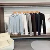 Camiseta de manga larga acanalada con capucha para mujer, de algodón, corte ajustado, favorecedora, versátil, de color liso, con botones, top base