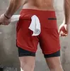 Venda direta da fábrica shorts esportivos de marca moderna de camada dupla, transpiráveis e de secagem rápida para homens, shorts esportivos de verão de comprimento 3/4 de secagem rápida para fitness