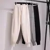Calça de Tricô Feminina 2026 Outono Inverno Calças Harem Calças Jogger Largas Cintura Alta Emagrecedoras Calças Longas de Tricô Tendência