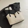 Bolsa de playa ins para vacaciones en la costa, simple y a la moda, moderna, bolso de mano simple, gran capacidad, bolso de paja texturizado para el día a día