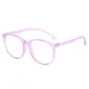 Gafas planas de moda anti luz azul con montura redonda, casuales y lindas, realzan el rostro, versátiles para fotografía callejera y uso casual