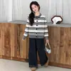 Conjunto de dos piezas de suéter de punto para niñas, nueva colección de otoño 2026, elegante y casual conjunto de cárdigan a rayas y pantalones de pierna ancha para niños mayores