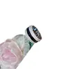 Anillo de Anillo de Rueda de Diamante Completo de Diseño de Industria Pesada Camelia Mismo Estilo que Jackson Wang Anillo de Anillo de Diamante de Fila de Obsidiana de Gama Alta para Hombres y Mujeres