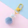 Colgante de Cuenta Estrella de Cinco Puntas Accesorios Otoño e Invierno Color Caramelo Lindo Colgante de Pompón Hebilla de Puerta Giratoria Llavero Venta al por Mayor