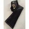 Jeans acampanados de cintura baja en negro y gris estilo retro americano para mujer, nuevos pantalones de campana ajustados con orejas de gato 2026