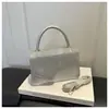 Bolso de hombro cruzado de gran capacidad estilo lujo para comercio exterior transfronterizo 2026 versión coreana color sólido simple