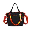 2026 Nuevo Bolso Tote Pequeño de Bloques de Color Dopamina Bolso de Mano Ligero de Nailon Bolso Cruzado para el Hombro para el Viaje Diario