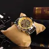 Reloj de pulsera mecánico manual retro hueco con números romanos europeos y americanos, 15 colores, ganador