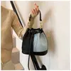 Bolsa de Comercio Exterior Bolsa para Mujer 2025 Nuevo Diseño de Nicho Transfronterizo Mezclilla Estampado Antiguo Versátil Hombro Cruzado Bolso Cubo