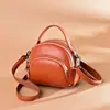 Bolsa Feminina Fashion de Couro Genuíno Bolsa Pequena Transversal Nova de Alta Qualidade Portátil Pequena Bolsa Redonda Bolsa de Ombro de Couro Feminina Versátil